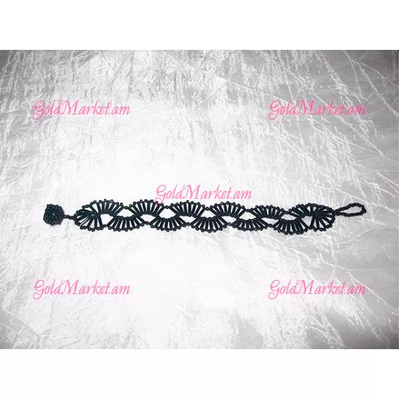 Браслет с мелкими черными камнями